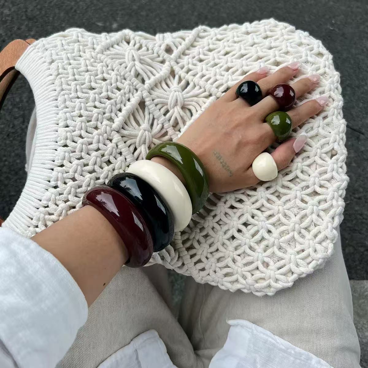 This eco-friendly resin bracelet for women, as seen on Instagram influencers, features a unique retro design, making it a stylish and versatile accessory.
