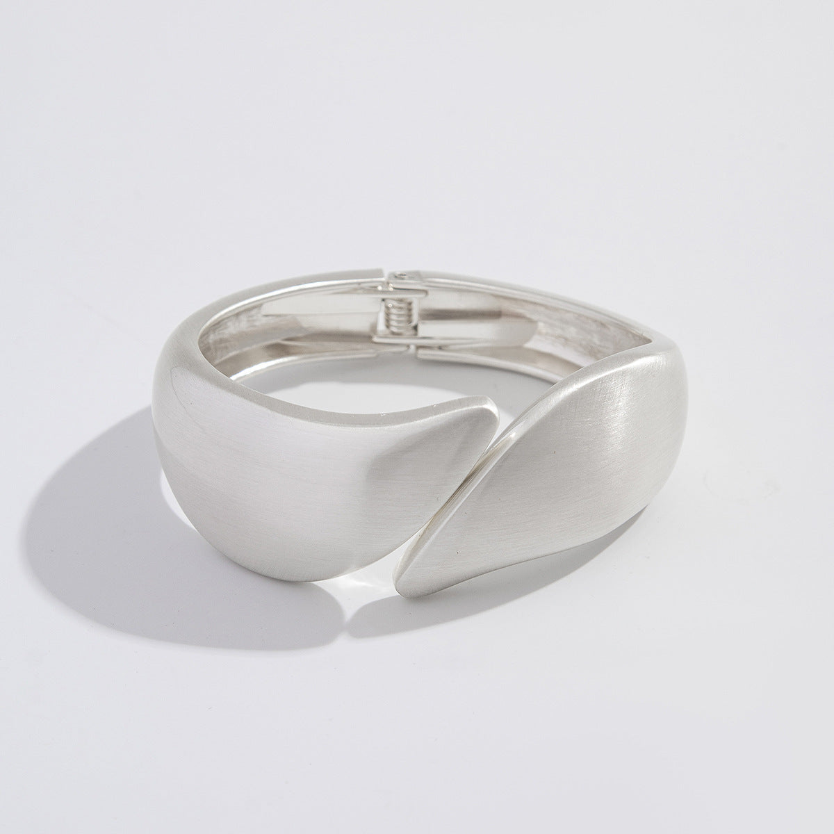 Punk-style exaggerated bracelet, wide irregular spring clasp, niche metal jewelry.