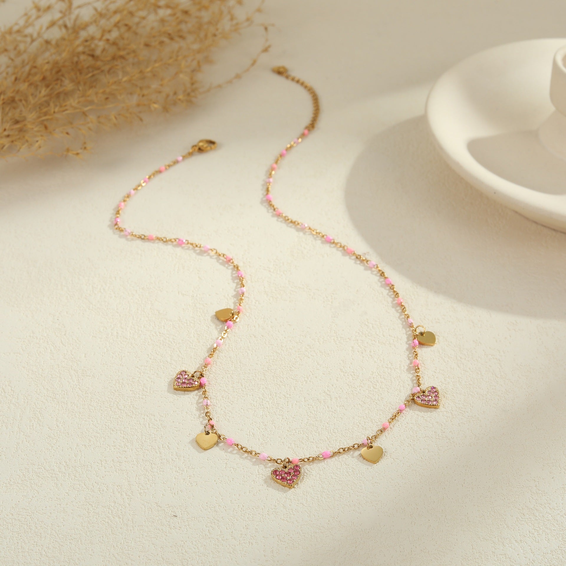 Trendy diamond-encrusted heart-shaped stainless steel clavicle chain necklace with a unique design.