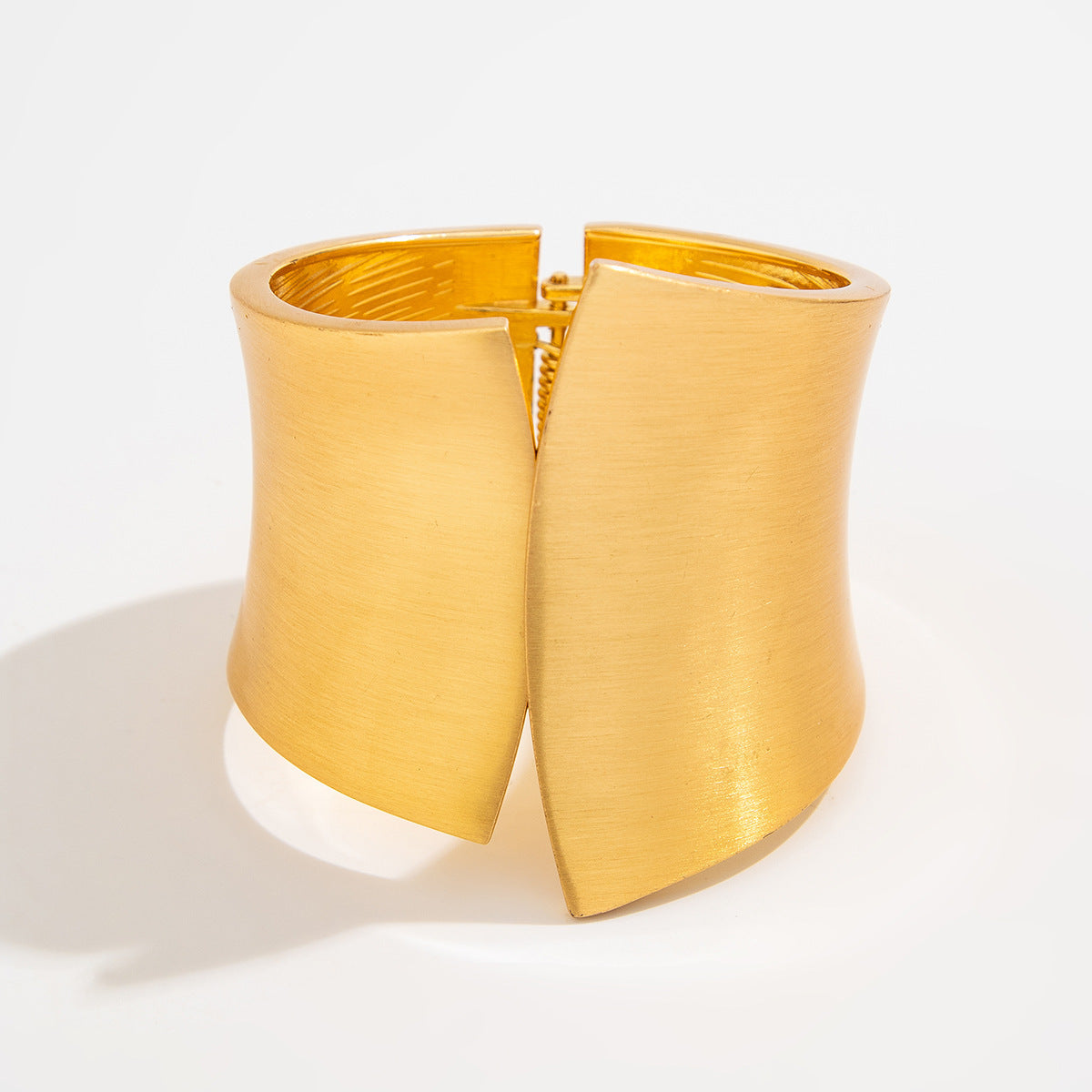 Punk-style exaggerated bracelet, wide irregular spring clasp, niche metal jewelry.