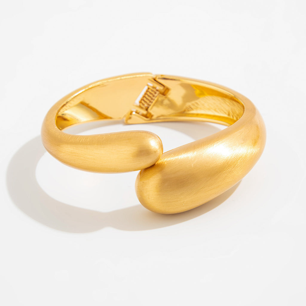 Punk-style exaggerated bracelet, wide irregular spring clasp, niche metal jewelry.