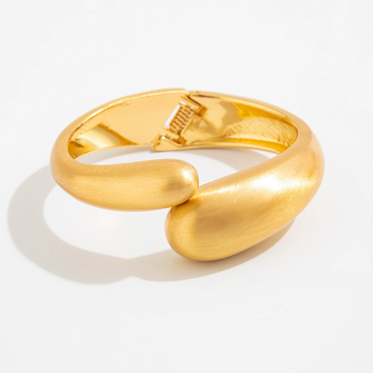 Punk-style exaggerated bracelet, wide irregular spring clasp, niche metal jewelry.