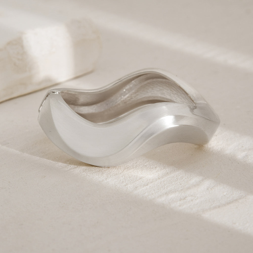 Punk-style exaggerated bracelet, wide irregular spring clasp, niche metal jewelry.