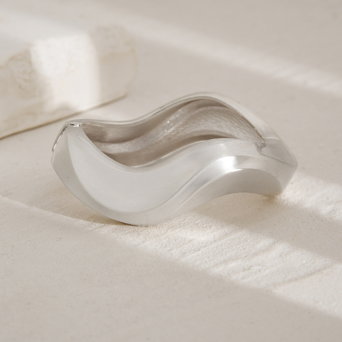 Punk-style exaggerated bracelet, wide irregular spring clasp, niche metal jewelry.